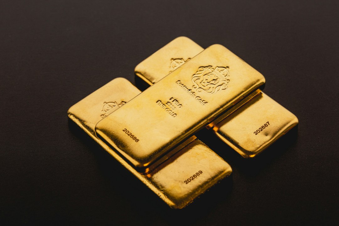 Gold bullion bars representing global commodities markets